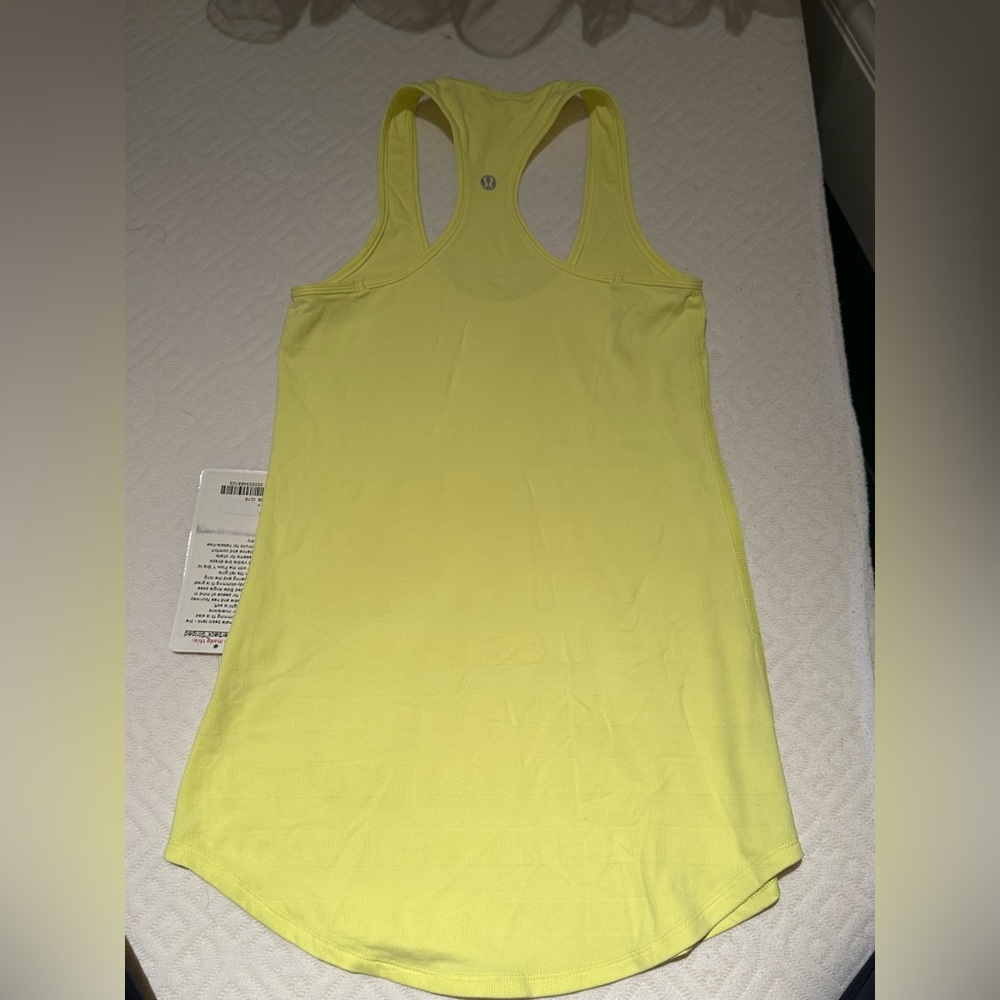 Women’s lululemon yellow workout top size 4.